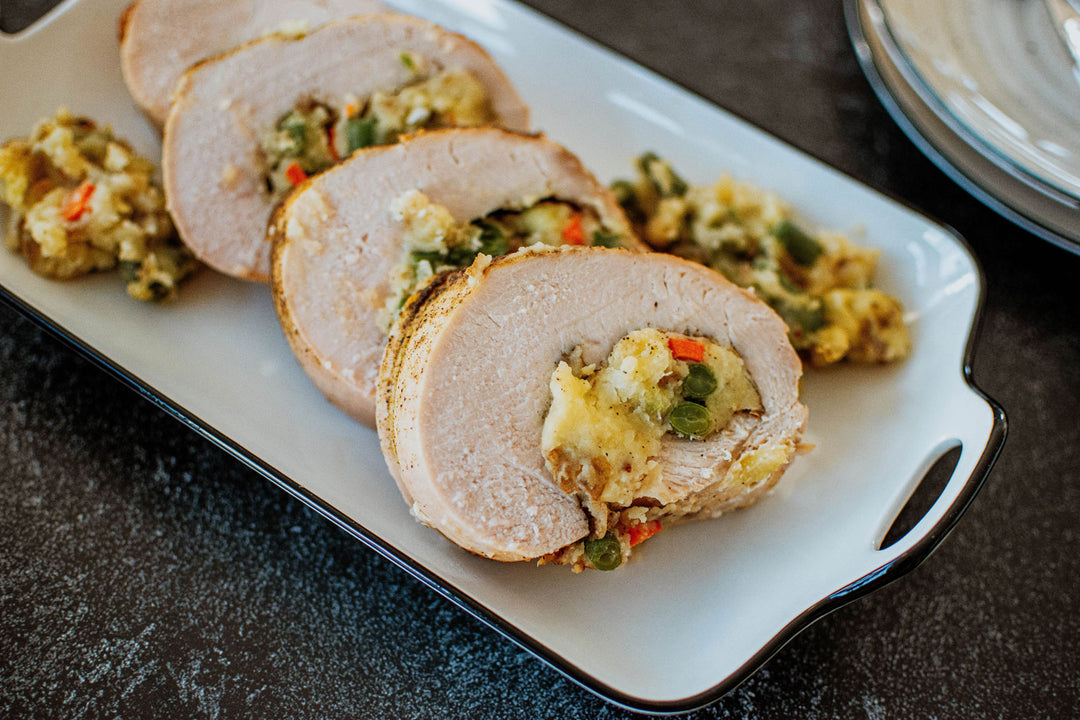 stuffed turkey breast with mashed potatoes and vegetables