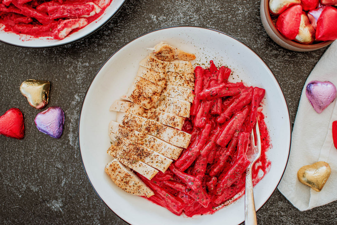 roasted garlic and beet chicken pasta in a bowl